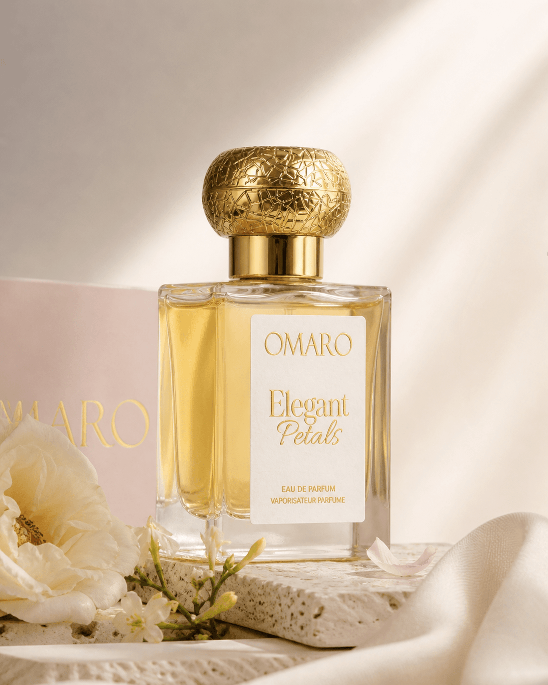 Close-up of Elegant Petals Eau de Parfum by Omaro with white floral accents.