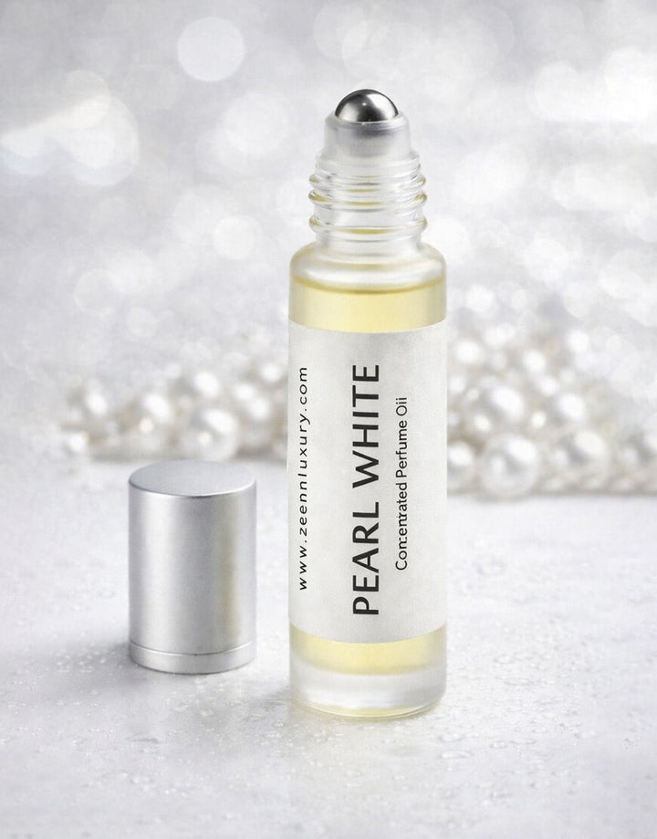 opened bottle of fresh, citrus, and woody scent profile of Pearl White, a top summer fragrance for men