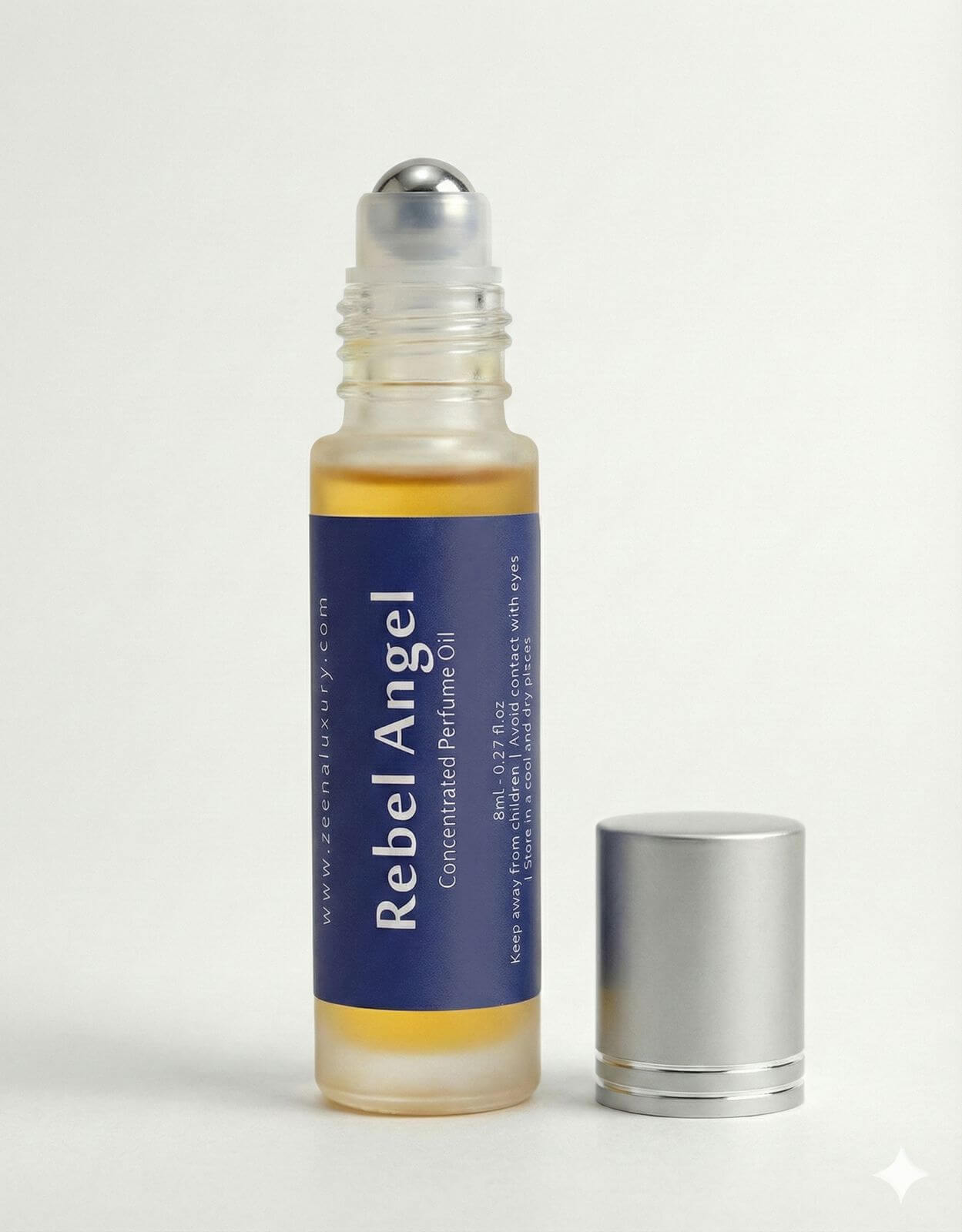 Rebel Angel 10ml luxury perfume oil bottle by Zeena Luxury inspired by Good Girl open bottle roll on.